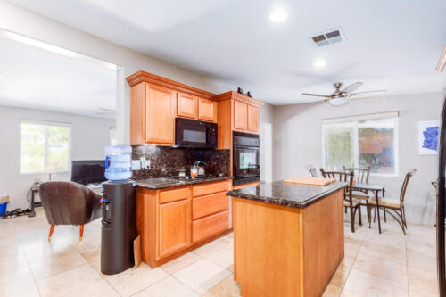 Updated Kitchen with Gas Range, Granite Countertops & Tons of Storage.